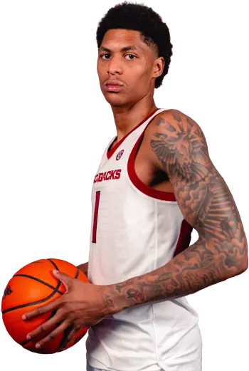 soccer player holding ball